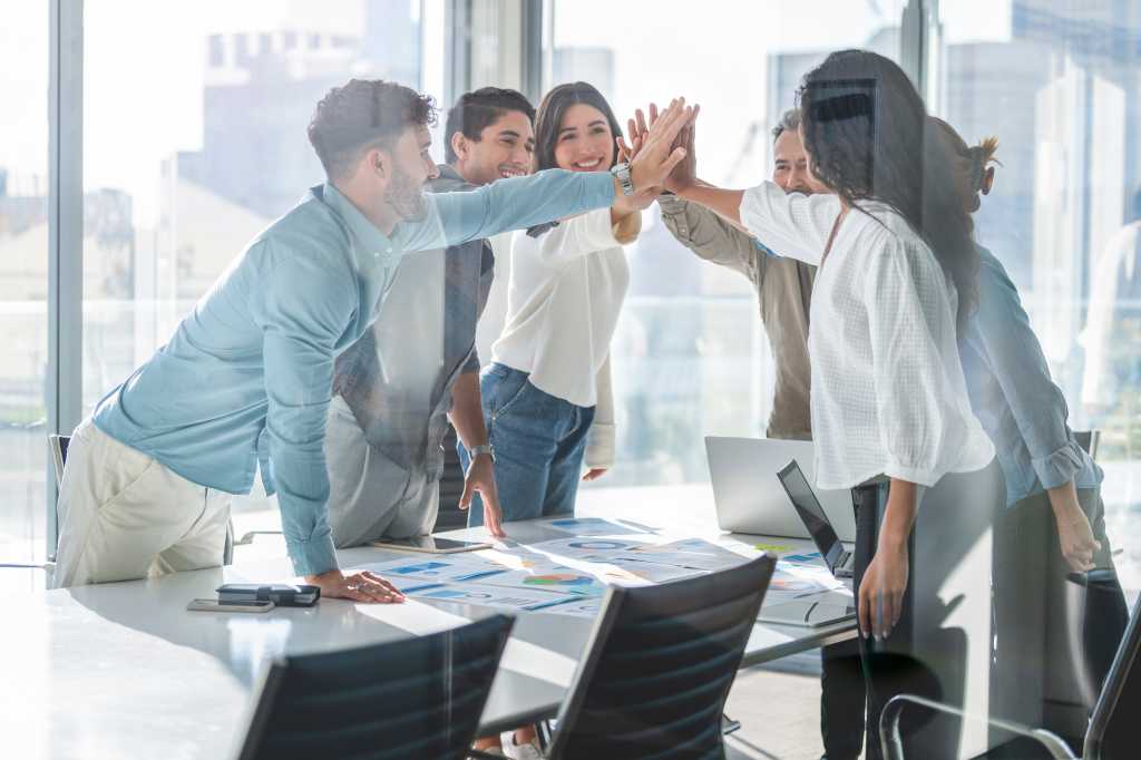 1 Business Team Celebrating Success With A High Five