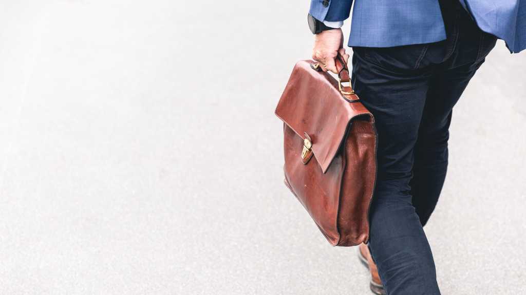 job hunter holding briefcase